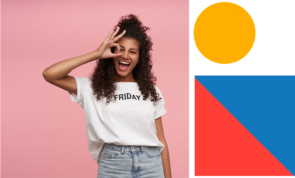 joyful-pretty-young-brunette-dark-skinned-woman-with-curly-long-hair-standing-on-pink-with-raised-hand-folding-ok-gesture-and-smiling-widely-dressed-in-casual-clothes